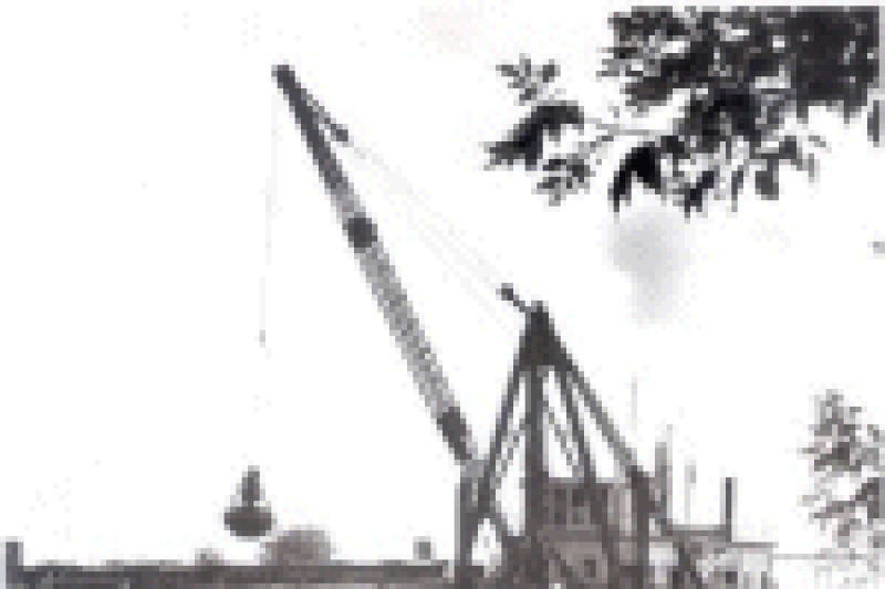 Newspapge photo of USACE Dredge Winneconne by John Spivey