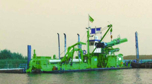 Vlieland barge unloading dredger