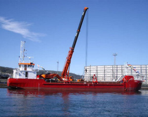 Omega trailing suction hopper dredger + Grab crane
