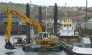Conquest Ipswich - backhoe dredge