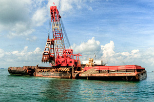 Minas - clamshell dredger
