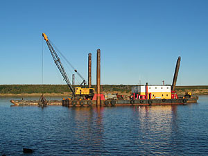 Cranemaster clamshell dredger